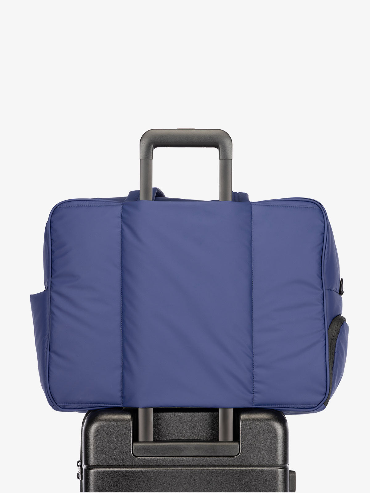 CALPAK Luka large travel duffel bag with trolley sleeve for luggage in navy blue; DLL2201-NAVY