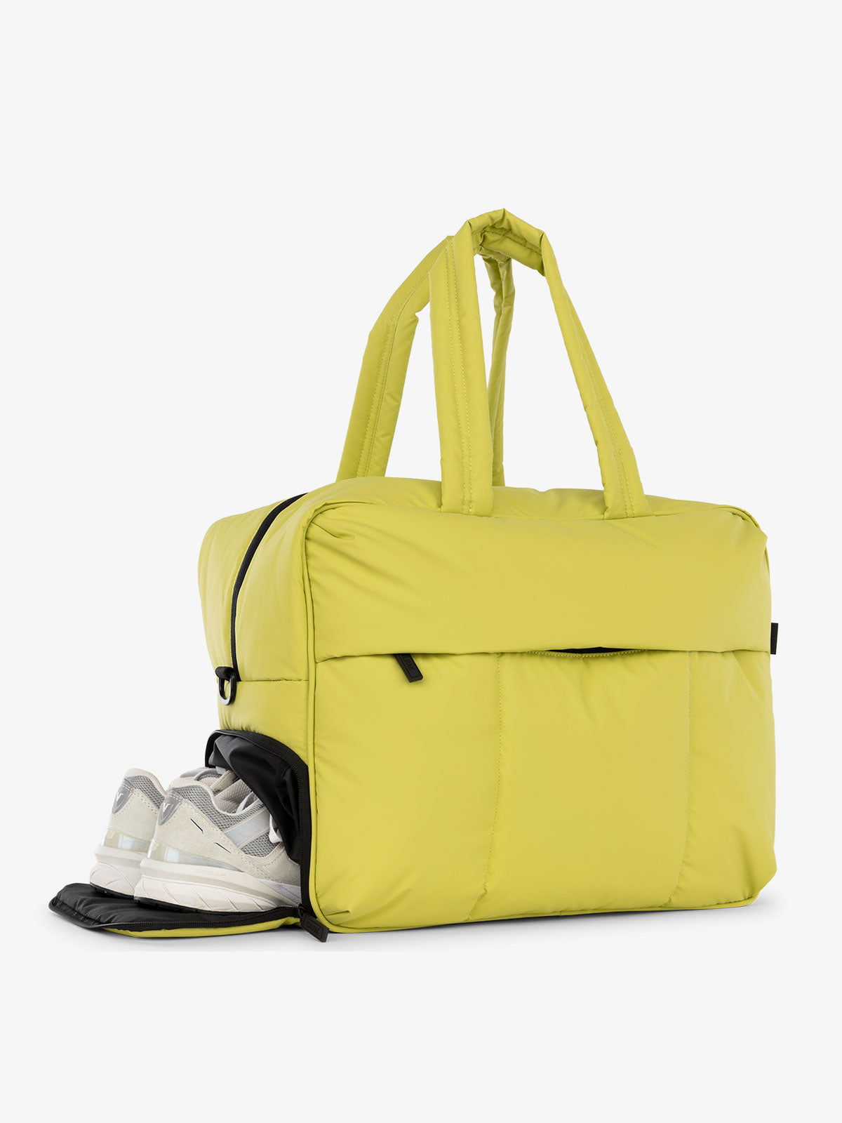 CALPAK Luka large duffel bag with side shoe compartment and dual handles in celery green; DLL2201-CELERY