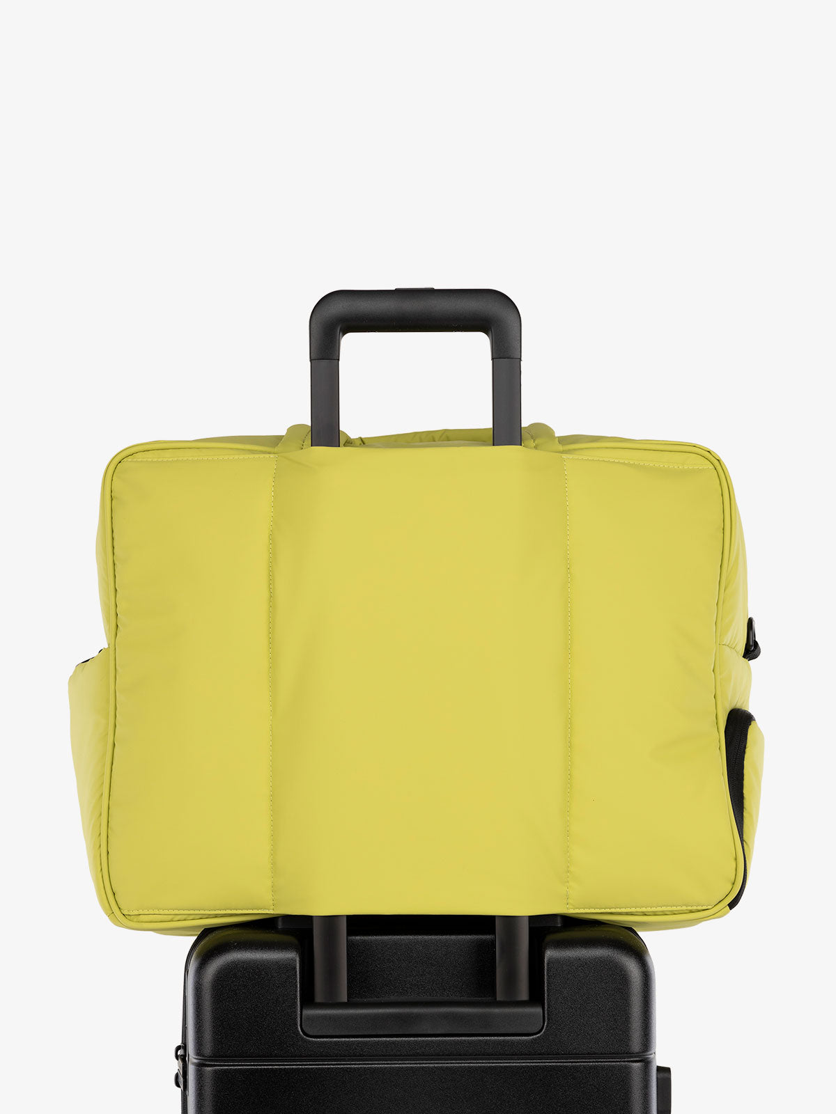 CALPAK Luka large duffel with trolley sleeve for luggage in light green; DLL2201-CELERY