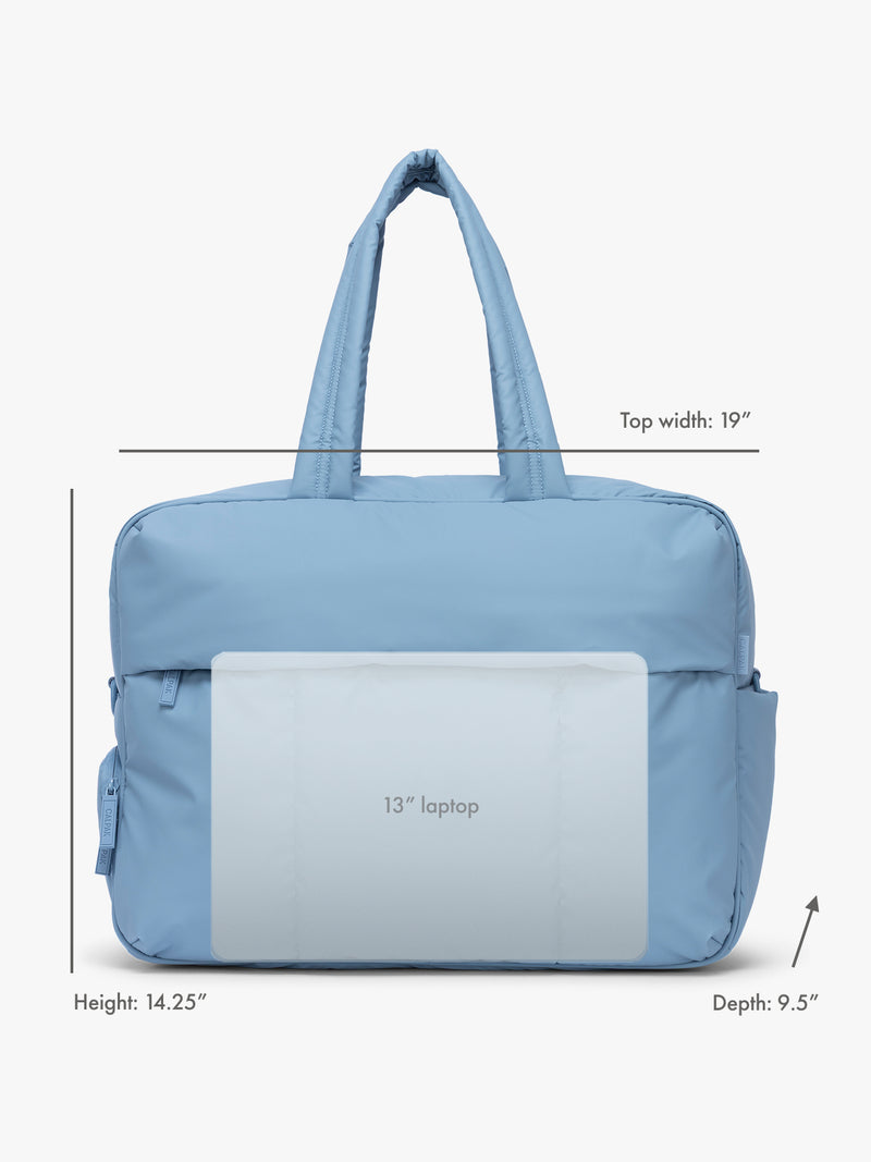 13" laptop overlay for size reference on CALPAK Luka Large Duffel in french blue