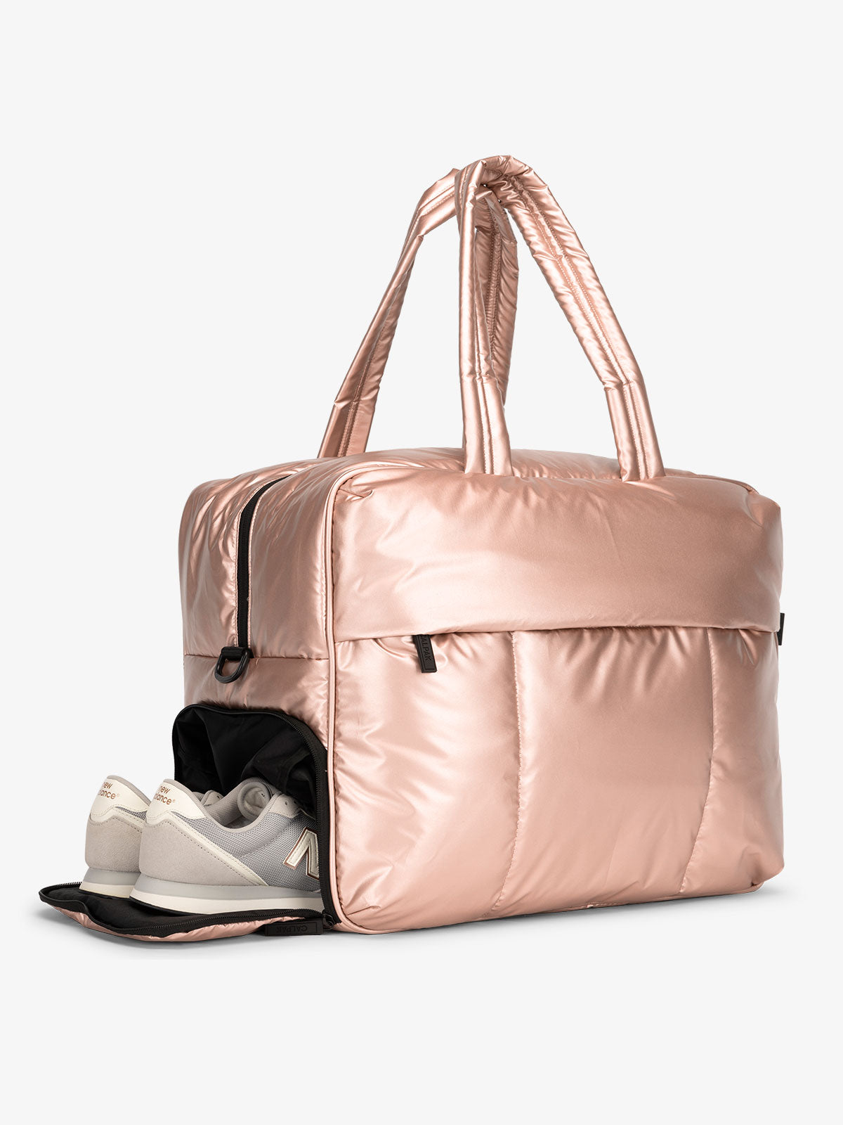 CALPAK Luka large duffel bag with side shoe compartment and dual handles in metallic rose gold; DLL2201-ROSE-GOLD