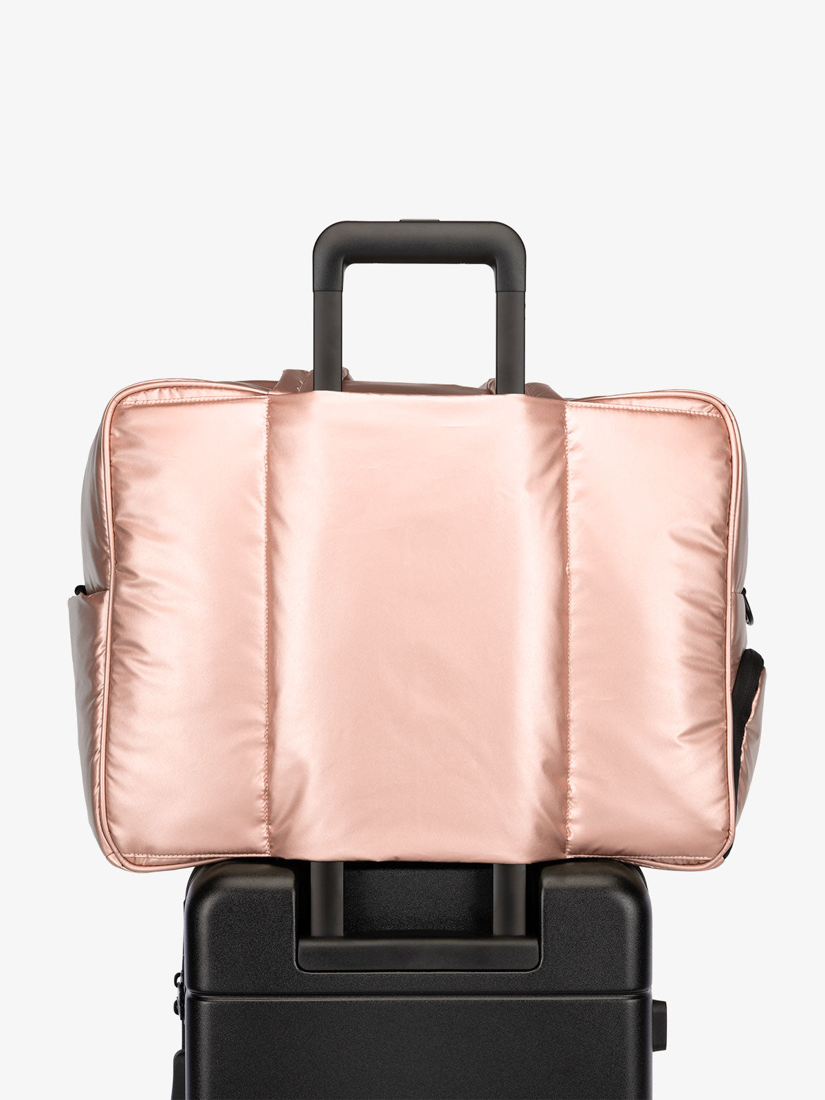 CALPAK Luka large travel duffel bag with trolley sleeve for luggage in rose gold; DLL2201-ROSE-GOLD