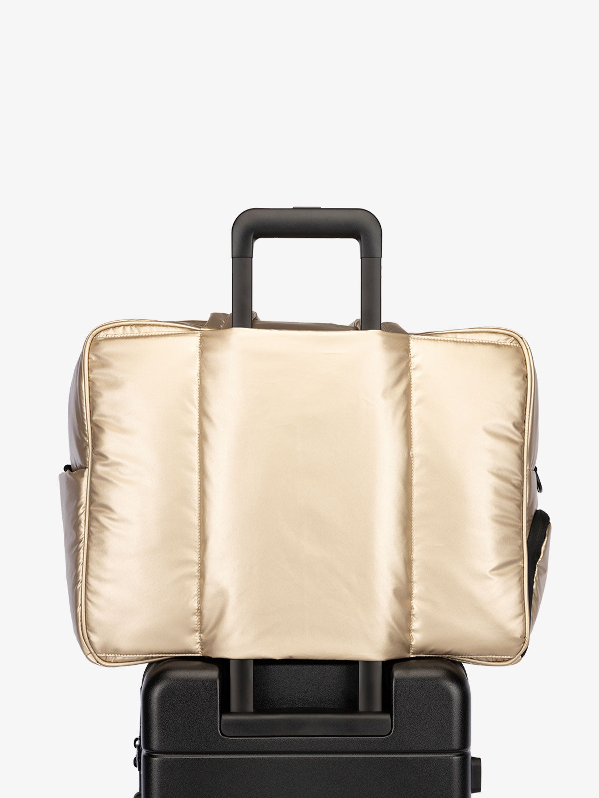 CALPAK Luka large travel duffel bag with trolley sleeve for luggage in gold; DLL2201-GOLD