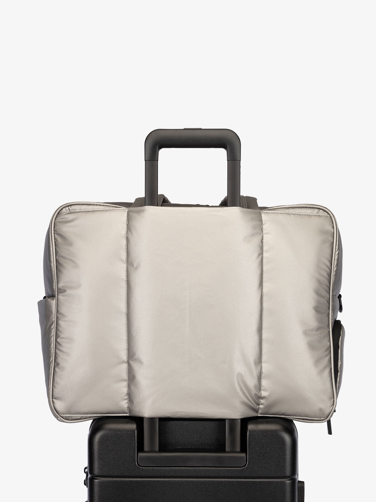 CALPAK Luka large travel duffel bag with trolley sleeve for luggage in shiny gunmetal; DLL2201-GUNMETAL