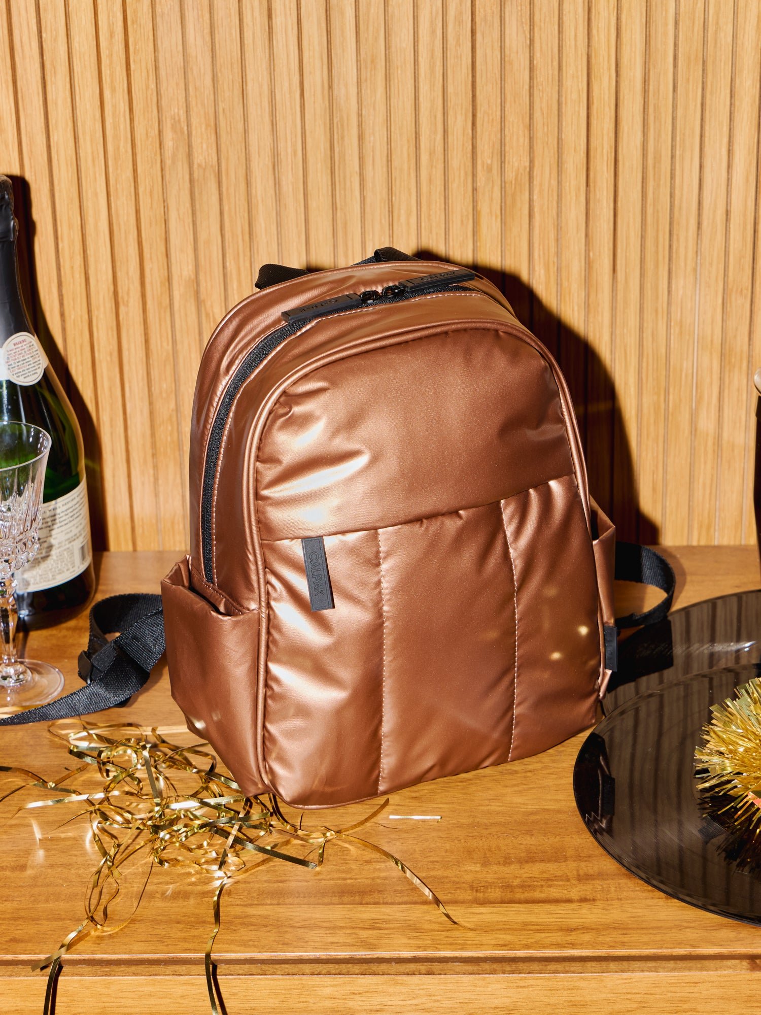 CALPAK Luka Mini Backpack in copper