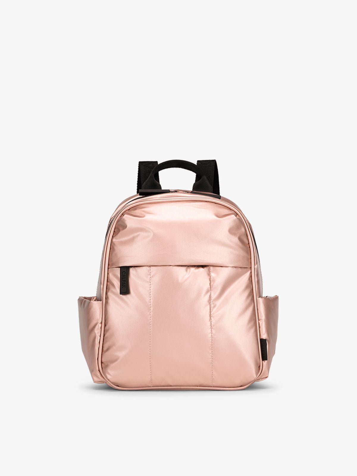 CALPAK Luka Mini Backpack with soft puffy exterior and front zippered pocket in metallic pink