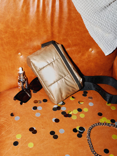CALPAK Luka Mini Belt Bag with soft puffy exterior in metallic gold; BBM2201-GOLD
