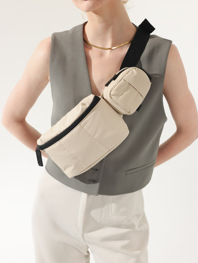 CALPAK Luka Mini Belt Bag with soft water-resistant exterior in oatmeal; BBM2201-OATMEAL