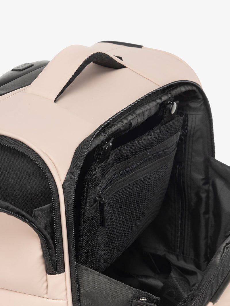 CALPAK Luka mini soft sided luggage interior pockets and top handle in light pink