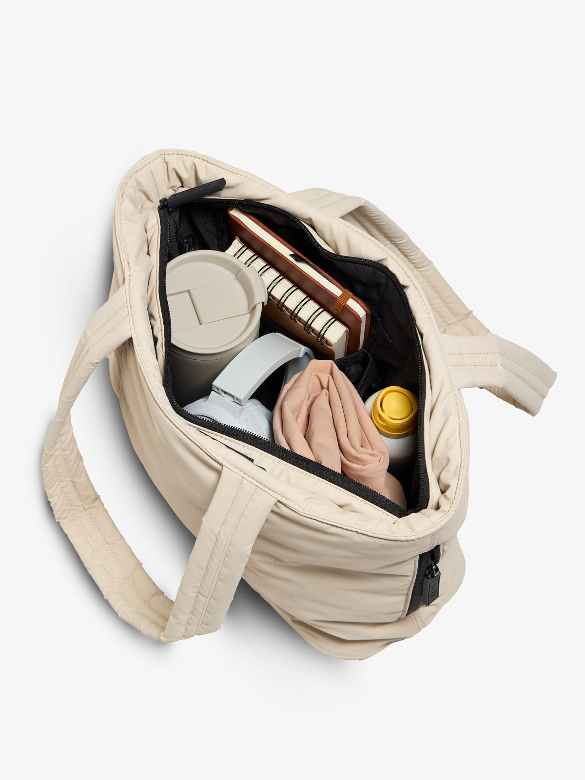 CALPAK luka mini tote with multiple interior pockets and water-resistant lining in beige oatmeal; ALM2401-OATMEAL