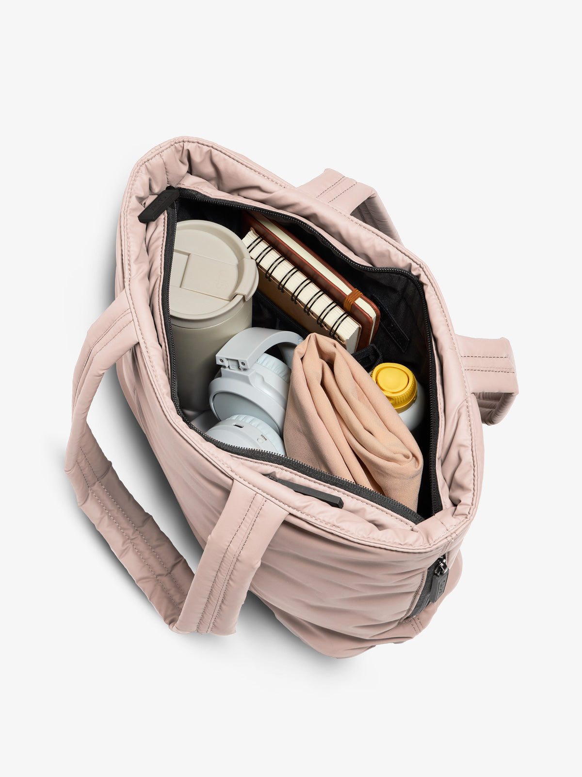 CALPAK luka mini tote with multiple interior pockets and water-resistant lining in pink rose quartz; ALM2401-ROSE-QUARTZ