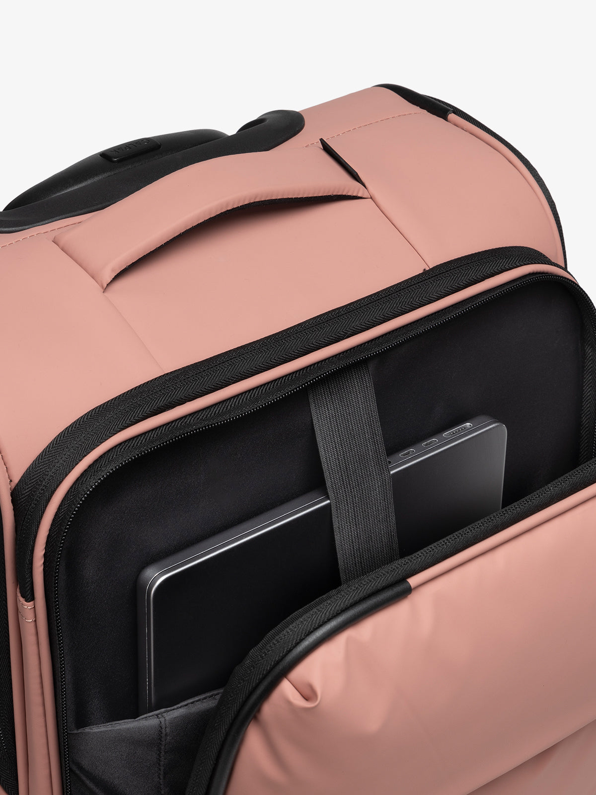 CALPAK Luka soft sided carry on luggage with top handle and padded laptop compartment in pink; LSM1020-PEONY