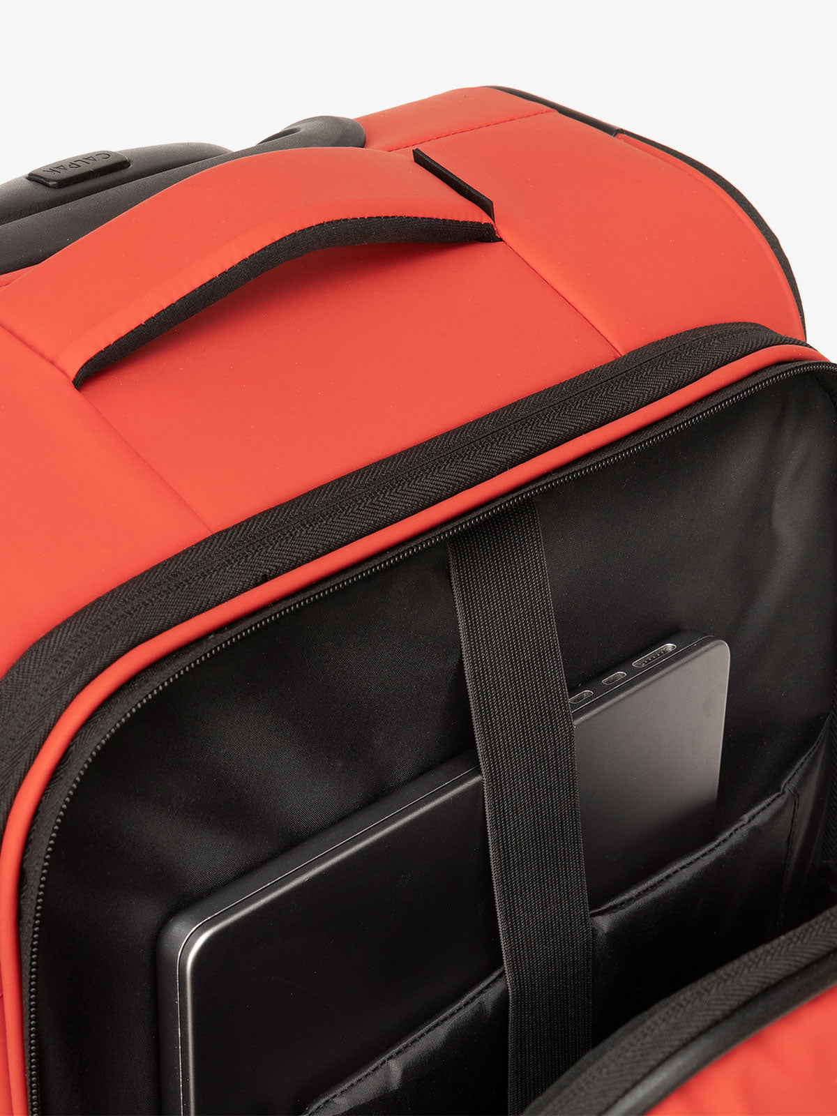 CALPAK Luka soft sided carry on luggage with top handle and padded laptop compartment in rouge red; LSM1020-ROUGE