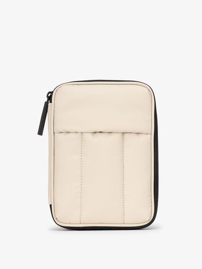 CALPAK Luka Zippered Passport Wallet with soft, puffy exterior in beige oatmeal; PZW2301-OATMEAL