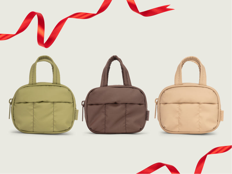 FREE Luka Duffel Zip Bag Charm with Any Luka Purchase