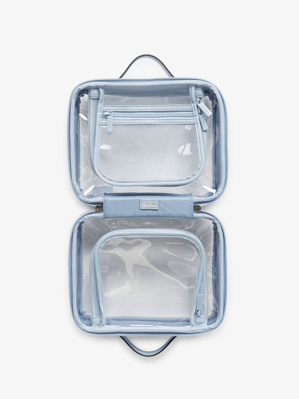 CALPAK clear travel makeup bag with zipper enclosed compartments in blue