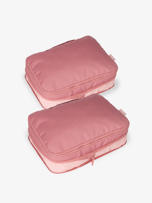 CALPAK compression packing cubes with top handles in tea rose