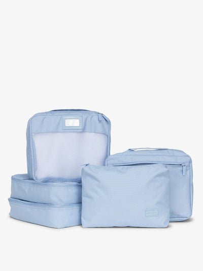 CALPAK 5 piece set packing cubes for travel with labels and top handles in sky; PC1601-SKY