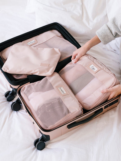 Deep green teal Kale CALPAK 5-piece travel packing cubes set which includes three mesh cubes, a flat cube, and a zippered organizer, displayed on a clean white background;PC1601-KALE view 2