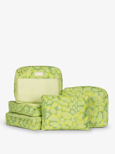 CALPAK 5 piece set packing cubes for travel with labels and top handles in lime green print; PC1601-LIME-VIPER view 1
