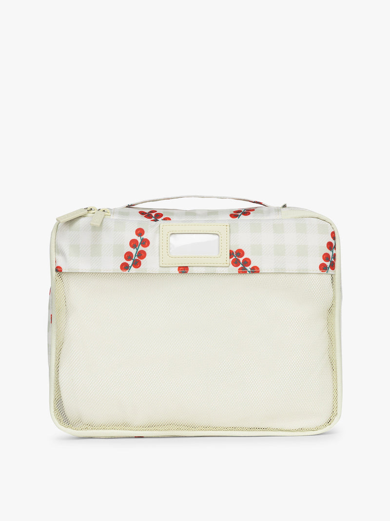 One of CALPAK 5pc Packing Cubes Set in white and green gingham pattern with tomato print