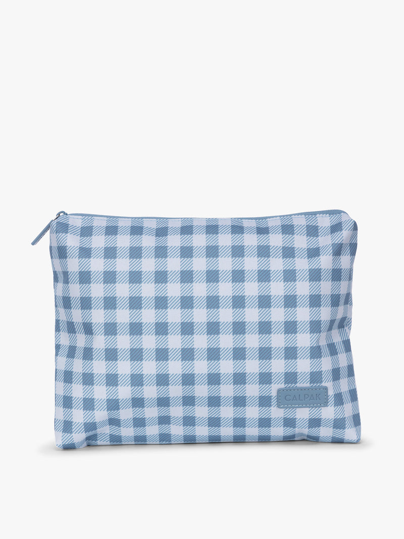 Top zippered packing cube that is part of CALPAK Packing Cubes 5-piece Set in white and blue gingham print in French Blue Gingham