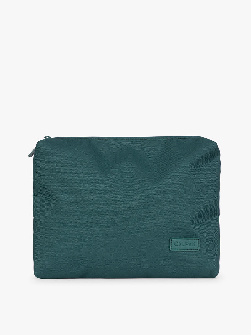 Deep green teal Kale CALPAK 5-piece travel packing cubes set with close up of envelope packing cube with top zipper displayed on a clean white background