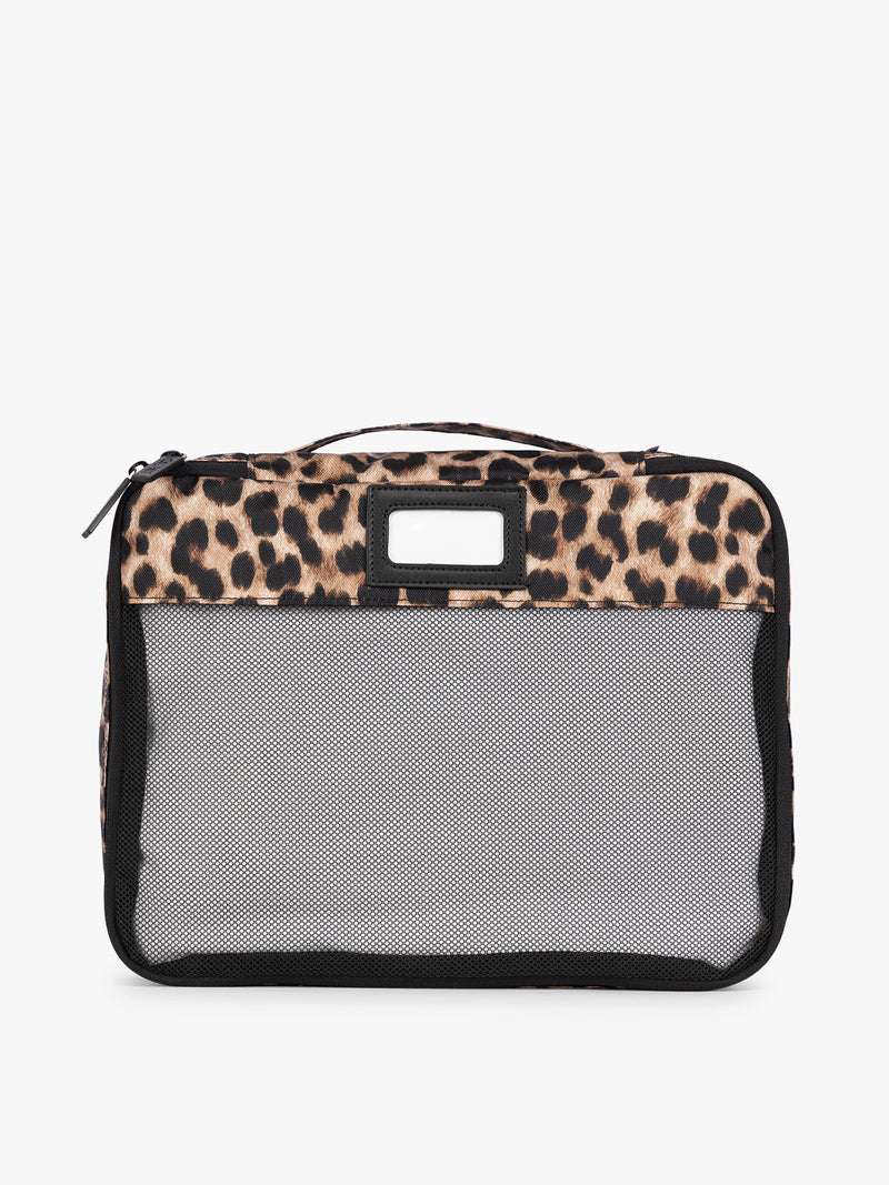 Tan and black animal print Snow Leopard CALPAK 5-piece travel packing cubes set with close up of mesh cubes with a label, displayed on a clean white background