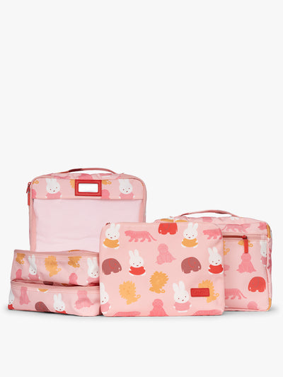 Set of CALPAK Packing Cubes in colorful pink pouches with Miffy and animal pattern on a white background; PC1601-MIFFY-PINK-ZOO-TRIP view 1