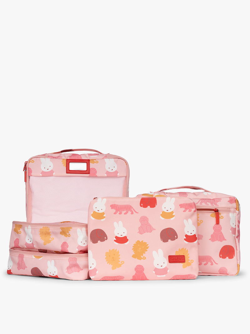 Set of CALPAK Packing Cubes in colorful pink pouches with Miffy and animal pattern on a white background
