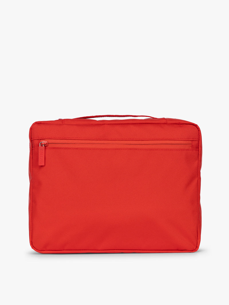 Backside of CALPAK 5pc Packing Cubes Set in red Tomato