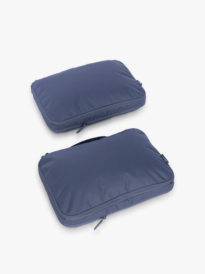 CALPAK Medium Compression Packing Cubes (Set of 2) compressed in dark blue Indigo