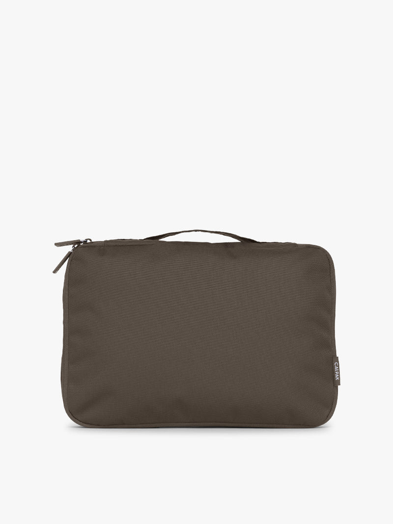 One of CALPAK Medium Compression Packing Cubes in brown Mushroom
