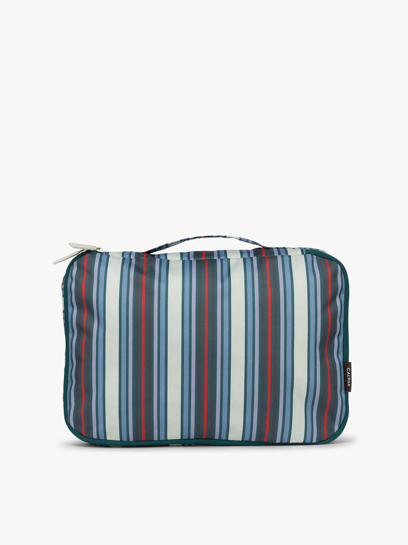 One of CALPAK Medium Compression Packing Cubes in multicolor stripe