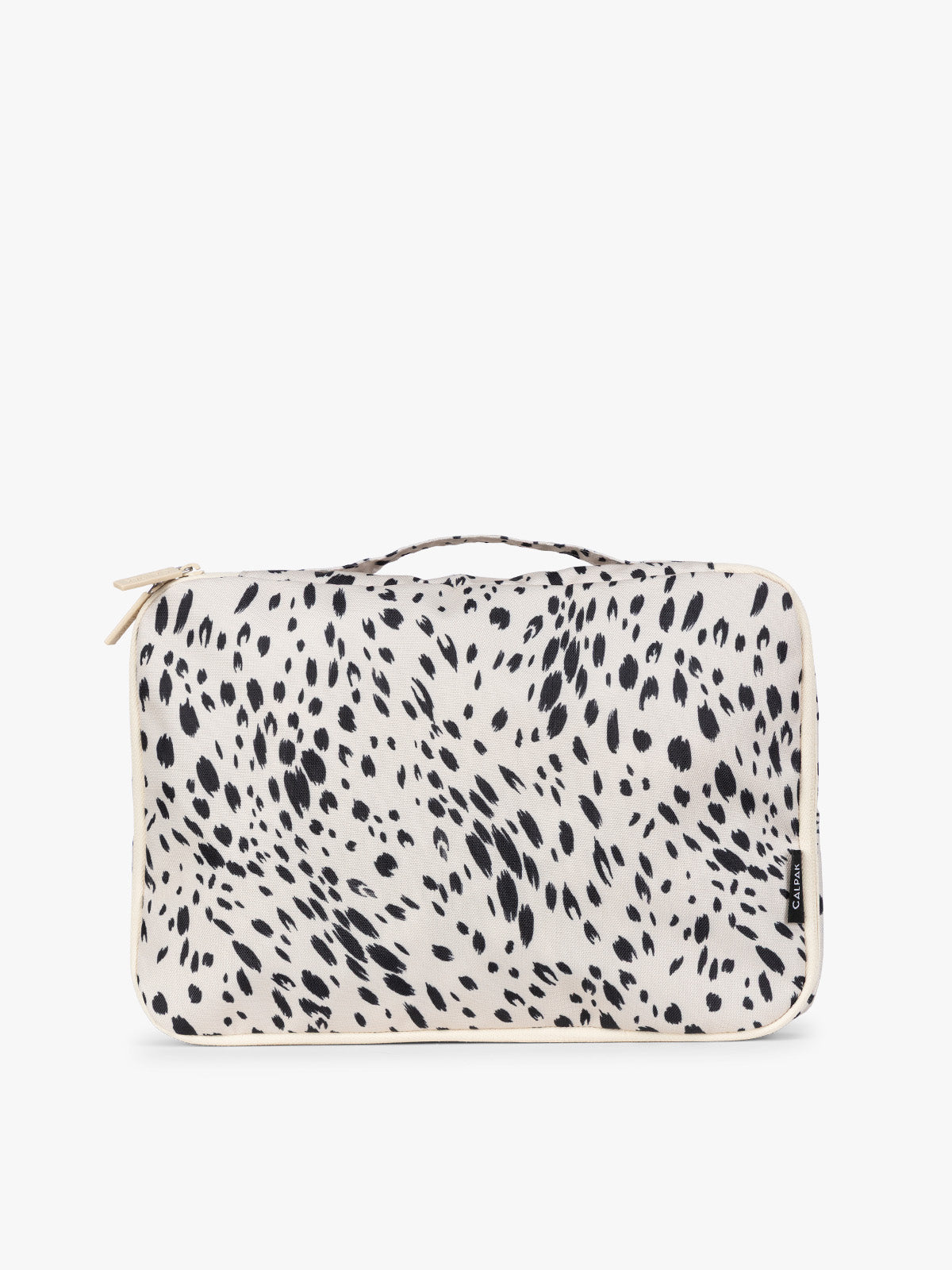 Close up of white and black animal print Snow Leopard CALPAK Medium Compression Packing Cubes with zippers shown on a clean white background; PCC2201-SNOW-LEOPARD