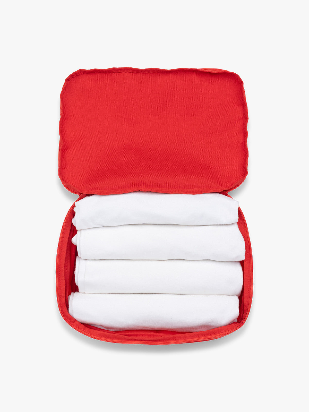 Opened CALPAK Medium Compression Packing Cubes in red Tomato; PCC2201-TOMATO