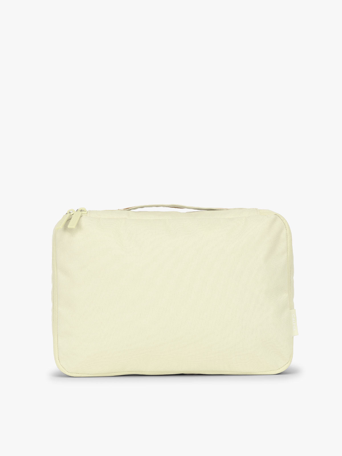 One of CALPAK Medium Compression Packing Cubes in light green Celadon; PCC2201-CELADON