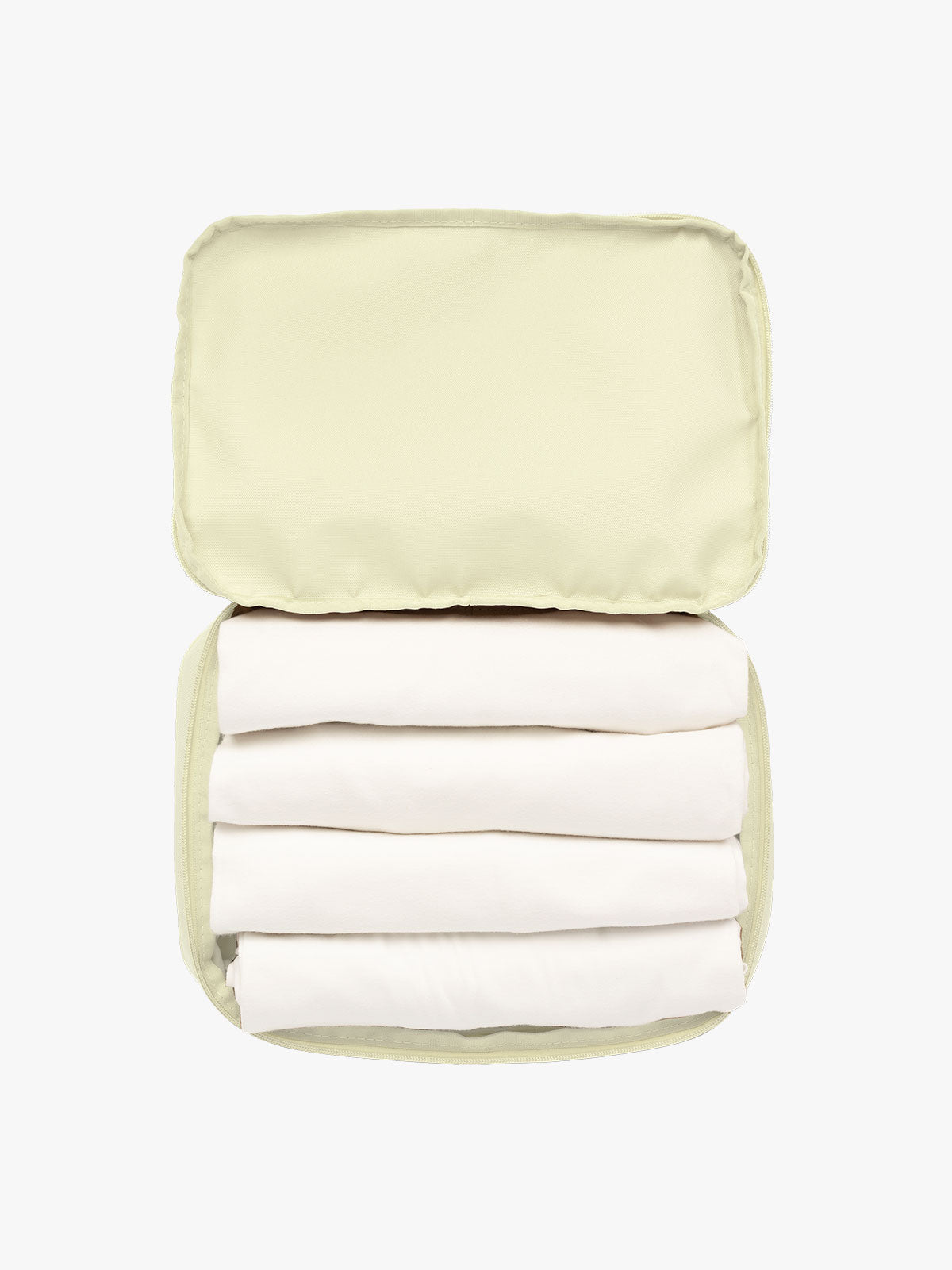 Items in CALPAK Medium Compression Packing Cubes in light green Celadon; PCC2201-CELADON