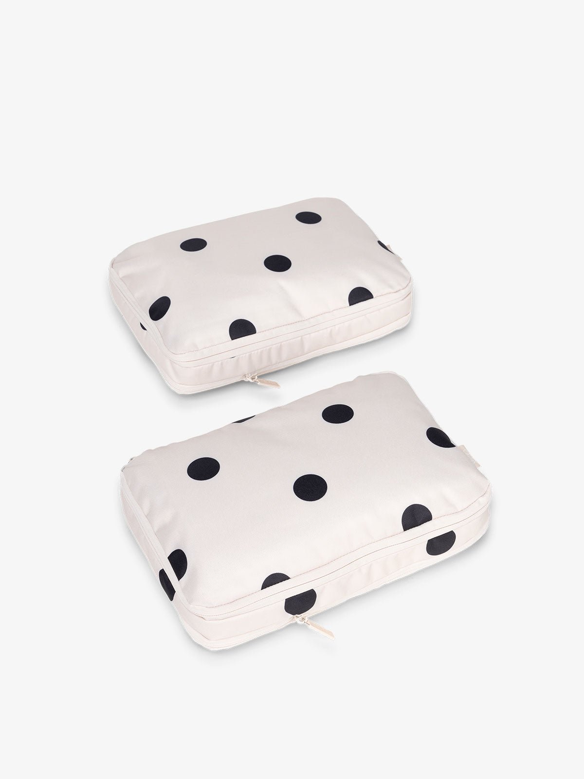 CALPAK small compression packing cubes in black and white polka dot