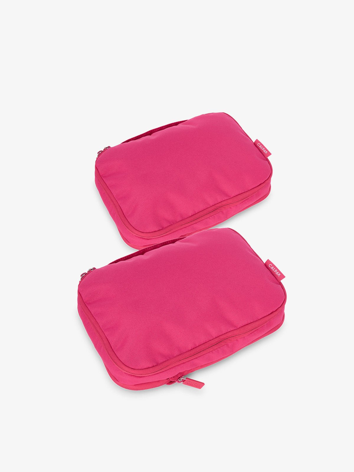 CALPAK small compression packing cubes in dragonfruit
