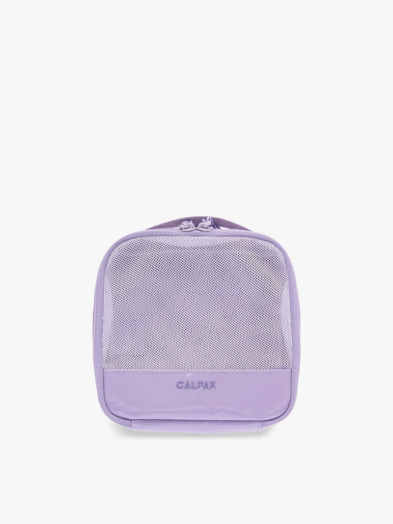 Small size packing cube of the CALPAK Terra 5-Piece Packing Cube Set in lavender Amethyst with two small cubes, two medium cubes, and one large mesh cube with zippers and mesh