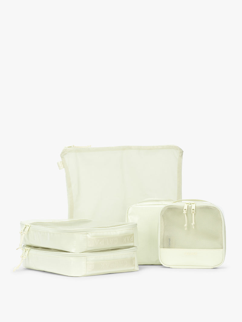 CALPAK Terra 5-Piece Packing Cube Set in light green Celadon with two small cubes, two medium cubes, and one large mesh cube with zippers and mesh