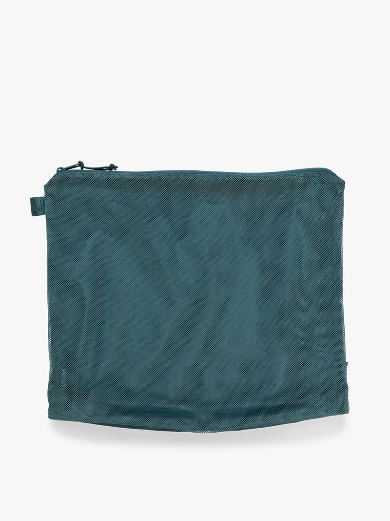 Zippered pouch of the CALPAK Terra 5pc Packing Cube Set in blue green Kale on a white background