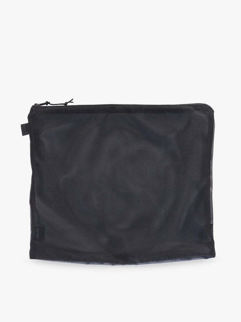 Large size packing cube of the CALPAK Terra 5-Piece Packing Cube Set in black Obsidian with two small cubes, two medium cubes, and one large mesh cube with zippers and mesh