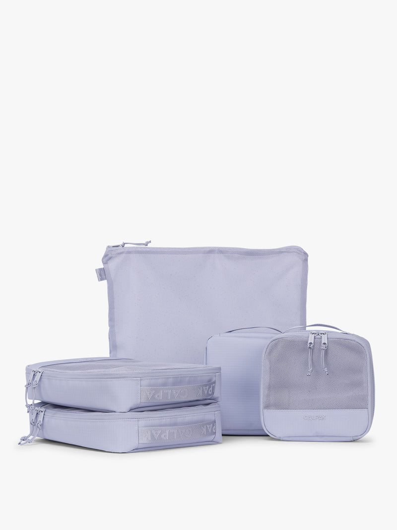CALPAK Terra 5-Piece Packing Cube Set in purple lavender Sea Glass with two small cubes, two medium cubes, and one large mesh cube with zippers and mesh