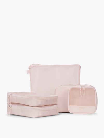 CALPAK Terra 5-Piece Packing Cube Set in pink Shell Pink with two small cubes, two medium cubes, and one large mesh cube with zippers and mesh; PCT2601-SHELL-PINK view 1