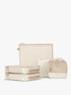 CALPAK Terra 5-Piece Packing Cube Set in off-white beige White Sands with two small cubes, two medium cubes, and one large mesh cube with zippers and mesh; PCT2601-WHITE-SANDS