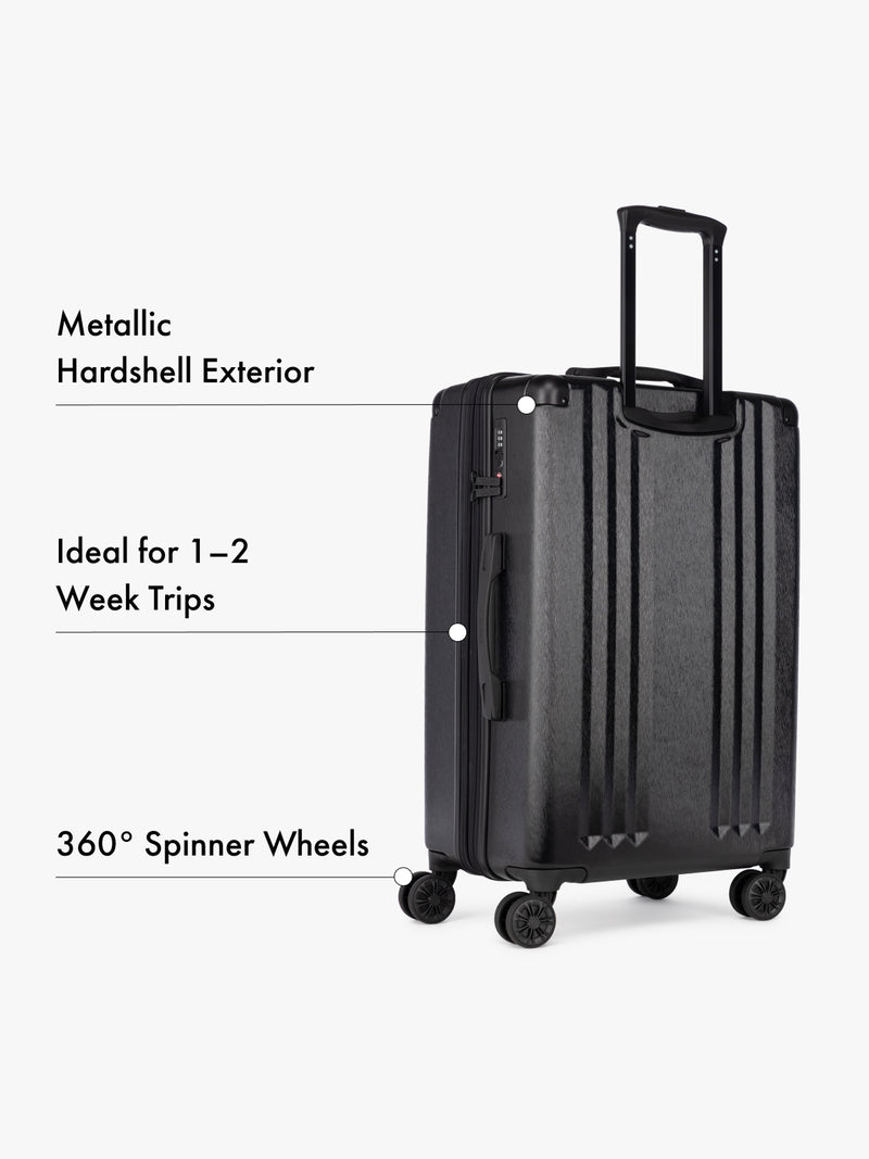 CALPAK Ambeur Black hardshell suitcase with text highlighting features on a white background