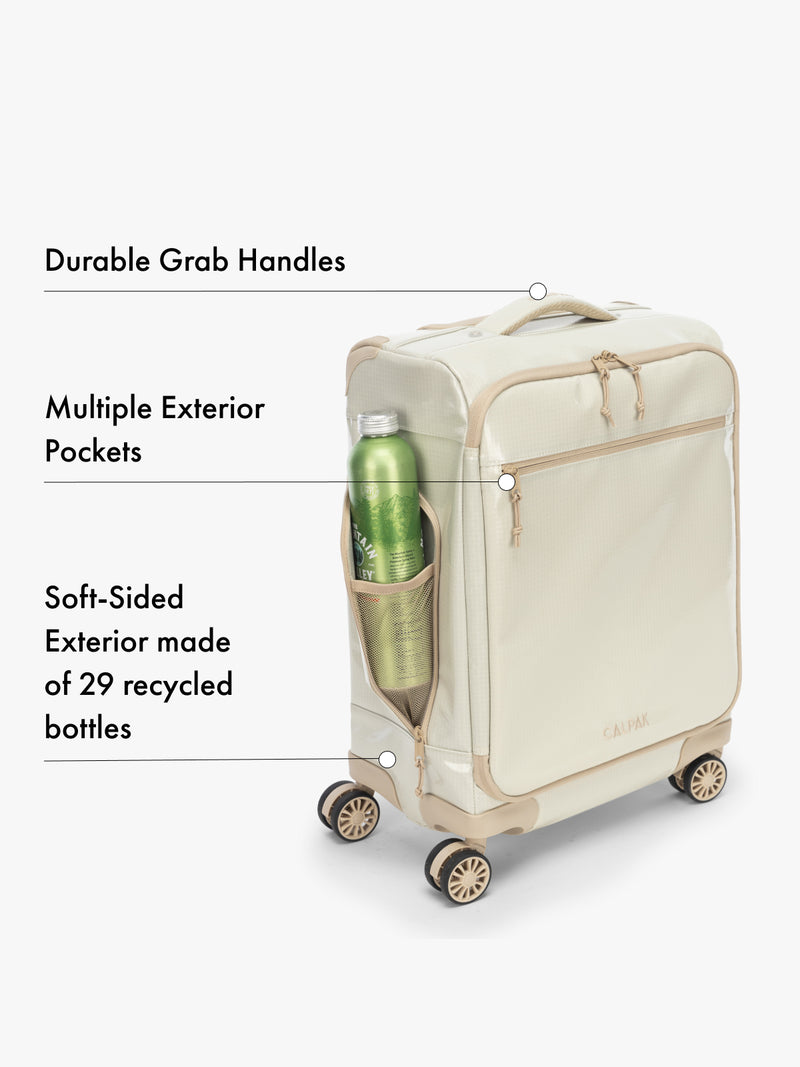 CALPAK Beige suitcase with durable grab handles and multiple exterior pockets, made from recycled materials