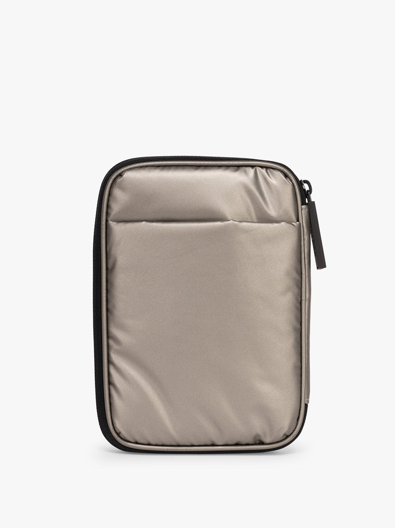 Back side with pocket of CALPAK Luka Zip Passport Wallet in metallic grey on a white background